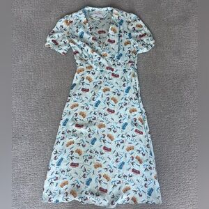 HVN light blue NYC print silk midi dress